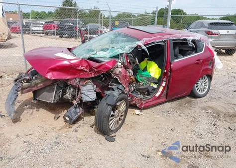 2014 Ford Fiesta Titanium из США, поврежденный, VIN 3FADP4FJ7EM204194